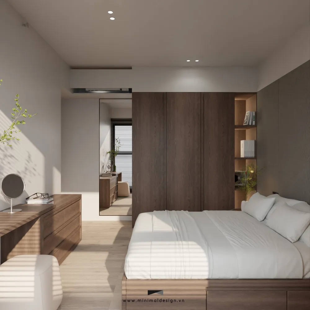 Phòng ngủ tối giản với giường gỗ, tủ âm tường và ánh sáng tự nhiên